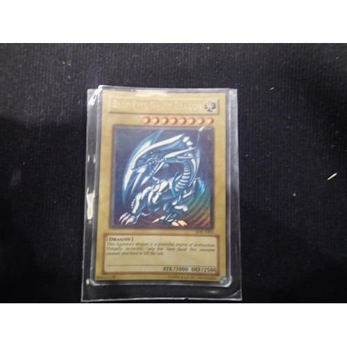 2202A - Small collection of sought after Yu-Gi-Oh! trading cards, to include three Blue-Eyes White Dragon. U... 