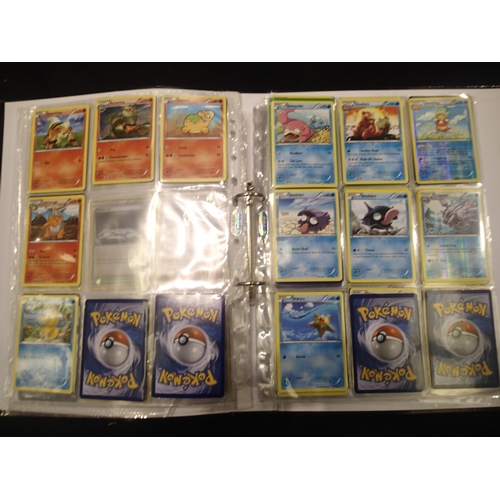 2202E - Collection of Pokemon trading cards in folder to include sought after trainer cards. UK P&P Group 1 ... 