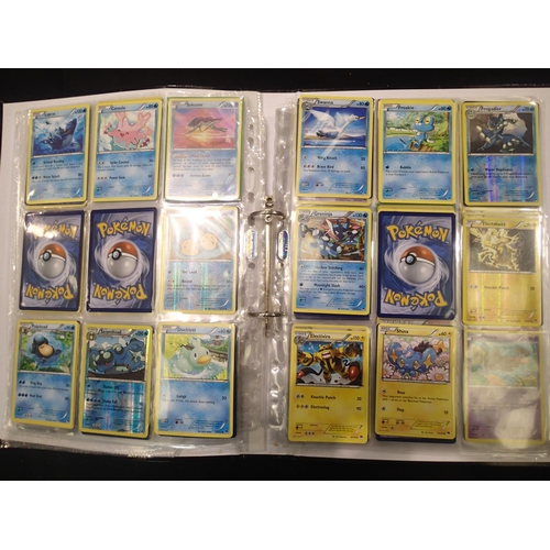 2202E - Collection of Pokemon trading cards in folder to include sought after trainer cards. UK P&P Group 1 ... 