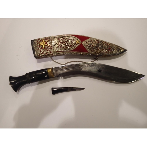 226 - *** WITHDRAWN *** An early 20th century Eastern presentation kukri, with brass mounted horn grip, a ... 