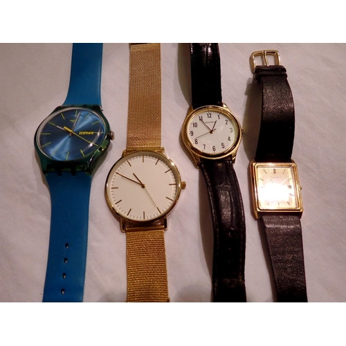 1060 - Four wristwatches including Accurist, Seconda and a Swatch watch. UK P&P Group 1 (£16+VAT for the fi... 