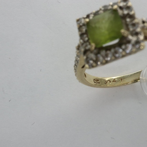 11 - 9ct gold cluster ring set with peridot and cubic zirconia, size L/M, 2.5g. UK P&P Group 0 (£6+VAT fo... 