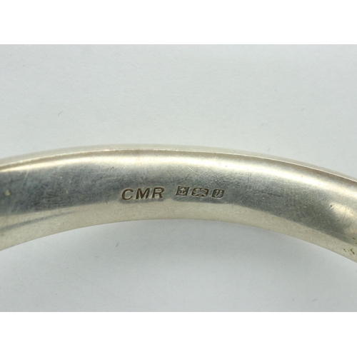 16 - Hallmarked silver snap bangle with safety chain, D: 70 mm, 15g. UK P&P Group 1 (£16+VAT for the firs... 