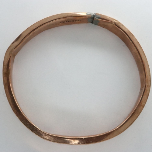 3 - 9ct rose gold bangle with metal core, D: 70 mm, 150g, slightly dented with solder repair. UK P&P Gro... 