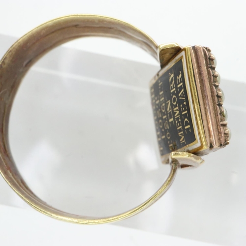 44 - Yellow metal mourning ring containing hair surrounded with seed pearls, inscription to back, size S,... 