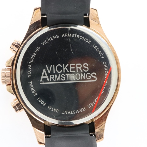 64 - VICKERS ARMSTRONG: gents wristwatch with date aperture and three subsidiary dials on a black rubber ... 