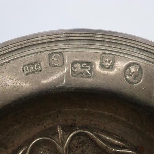 69 - Hallmarked silver dish with poppy decoration in relief, London assay, D: 13 cm. 98g. UK P&P Group 1 ... 