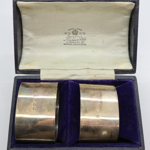 71 - Pair of hallmarked silver napkin rings, London assay, 60g, cased. UK P&P Group 1 (£16+VAT for the fi... 