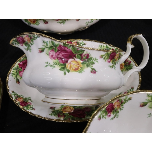 155 - Royal Albert Old Country Roses tea and dinnerware of forty seven pieces, including place mats. Not a... 