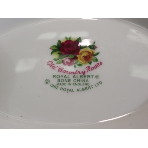 155 - Royal Albert Old Country Roses tea and dinnerware of forty seven pieces, including place mats. Not a... 