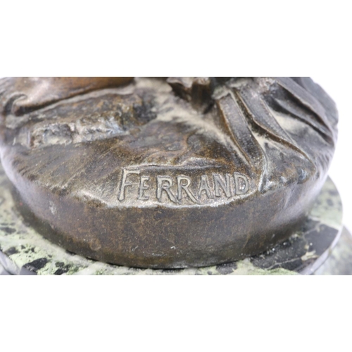 221 - Spelter newel post lamp of a boy holding a flaming torch on a marble case, signed Ferrand, hole to f... 