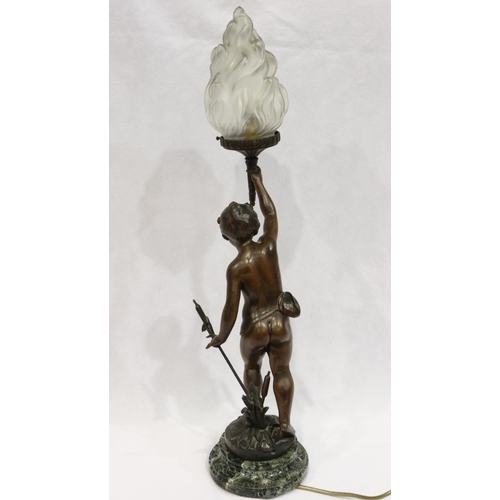 221 - Spelter newel post lamp of a boy holding a flaming torch on a marble case, signed Ferrand, hole to f... 