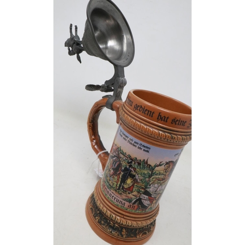 2066 - A German salt glazed stein by Gerz, with pewter hinged cover and pictorial decoration (loss of head ... 