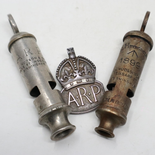 2097 - A British Home Front ARP whistle by Hudson & Co, a hallmarked silver ARP buttonhole and an 1899 date... 