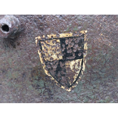 2129 - An Imperial German WWI relic steel M-16 helmet shell, displaying remnants of paint and single decal,... 