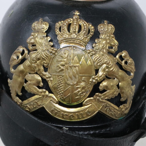 2139 - An early 20th century Bavarian pickelhaube, leather bound with brass fittings and leather liner. UK ... 