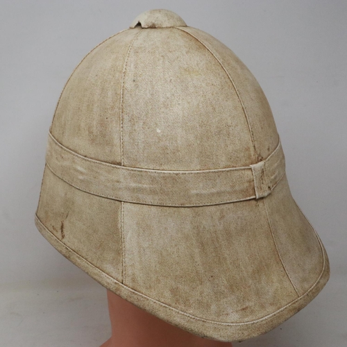 2144 - An early replica pith helmet in the Victorian style, bearing plate for 24th Regiment of foot. UK P&P... 