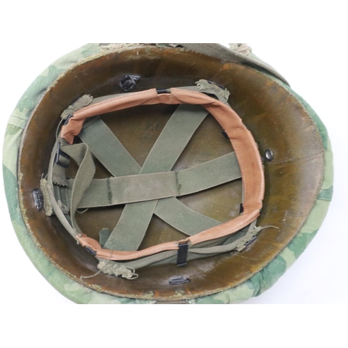 2149 - An American M-1 helmet, liner and camouflage cover. UK P&P Group 3 (£30+VAT for the first lot and £8... 