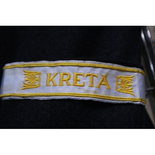 2166 - A German WWII reenactors Luftwaffe officers tunic, displaying ribbon bar, embroidered cuff title, ob... 