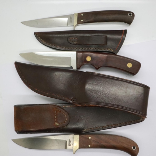 2037 - Two Rhino knives with leather sheaths and a KMV hunting knife (3). UK P&P Group 2 (£20+VAT for the f... 