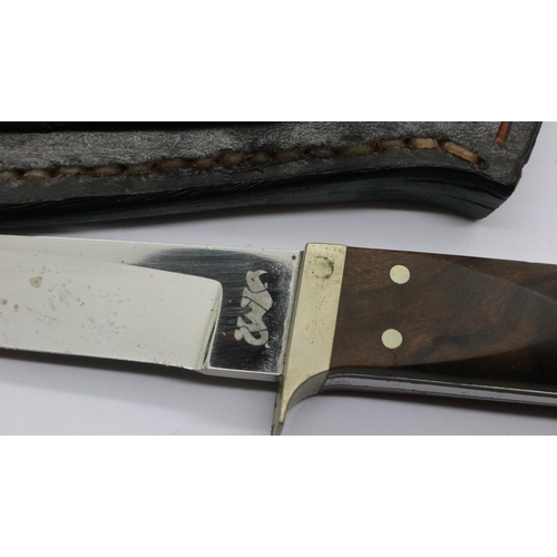 2037 - Two Rhino knives with leather sheaths and a KMV hunting knife (3). UK P&P Group 2 (£20+VAT for the f... 