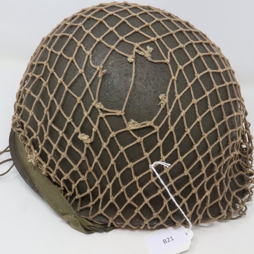 2099 - Original US WWII M1 Airborne helmet 1944 specification. rear seam, swivel bails, helmet is heat stam... 