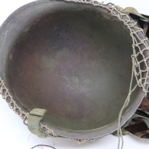 2099 - Original US WWII M1 Airborne helmet 1944 specification. rear seam, swivel bails, helmet is heat stam... 