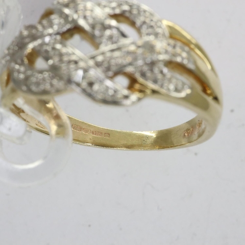 35 - 9ct gold crossover ring set with diamonds, size N/O, 2.8g. UK P&P Group 0 (£6+VAT for the first lot ... 