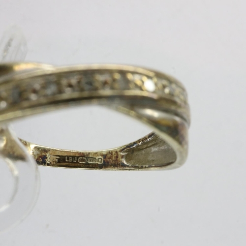 44 - 9ct gold crossover ring set with diamonds, size L, 2.0g. UK P&P Group 0 (£6+VAT for the first lot an... 