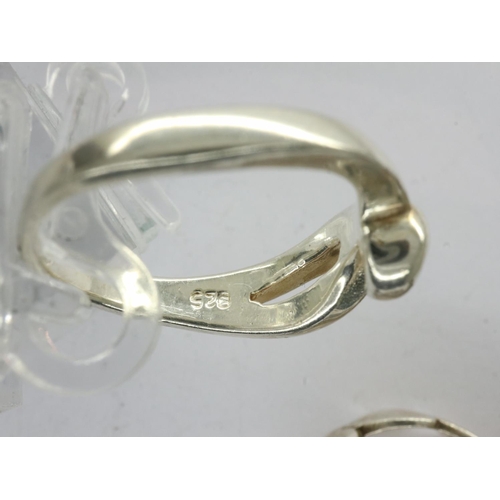 46 - Four 925 silver rings and a hallmarked silver example (5), various sizes. UK P&P Group 1 (£16+VAT fo... 