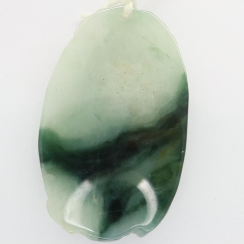 48 - Unusual carved jade pendant, H: 45 mm. UK P&P Group 1 (£16+VAT for the first lot and £2+VAT for subs... 