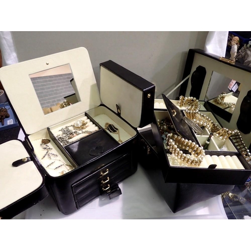 1150 - Two jewellery boxes with contents including a 9ct gold earring. Not available for in-house P&P