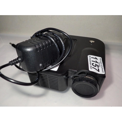 1157 - Mini LED Projector has HDMI connection with power supply, working at lotting. UK P&P Group 2 (£20+VA... 