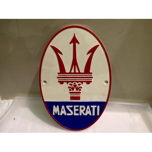 1158 - Cast iron Maserati sign, H: 29 cm. P&P Group 2 (£18+VAT for the first lot and £3+VAT for subsequent ... 