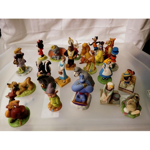 1214 - Twenty two miniature ceramic Disney character figurines. Not available for in-house P&P