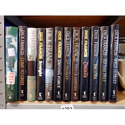 1282 - Thirteen hardback books, twelve by Dick Francis, including a signed copy. Not available for in-house... 