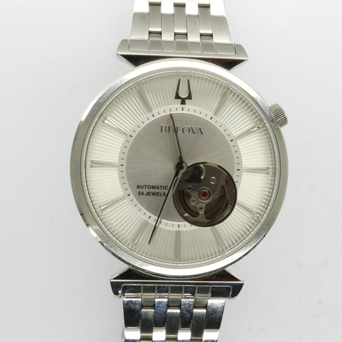 119 - BULOVA: gents automatic 24 jewel wristwatch with skeleton movement on a stainless steel bracelet, bo... 