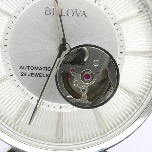 119 - BULOVA: gents automatic 24 jewel wristwatch with skeleton movement on a stainless steel bracelet, bo... 