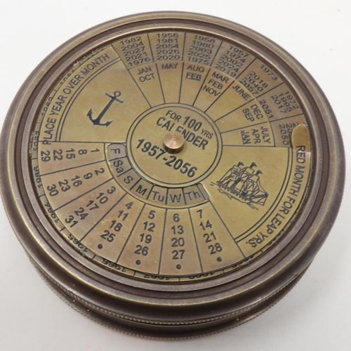 144 - Brass calendar and compass, D: 80 mm. UK P&P Group 1 (£16+VAT for the first lot and £2+VAT for subse... 