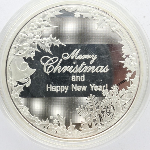 173 - Christmas commemorative enamelled silver coin. UK P&P Group 0 (£6+VAT for the first lot and £1+VAT f... 