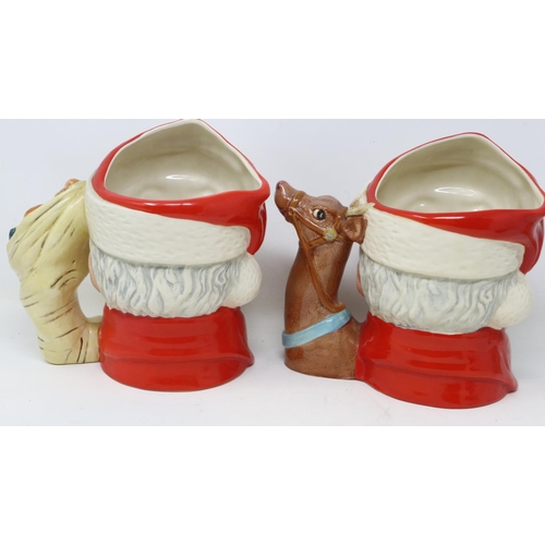 263 - Two Royal Doulton Santa Claus character jugs, D6675 and D6690, no cracks or chips, largest H: 19 cm.... 