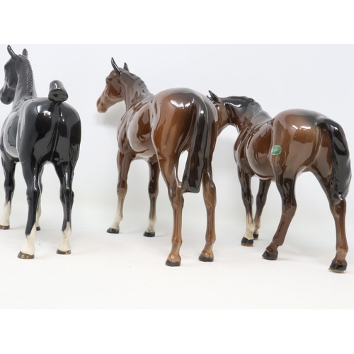 268 - Beswick Champion Black Magic horse, H: 20 cm, and two further Beswick horses (3), glue residue to ho... 