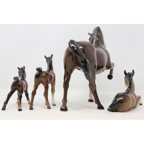 289 - Beswick horse and three Beswick foals, no cracks or chips, largest H: 19 cm. UK P&P Group 2 (£20+VAT... 