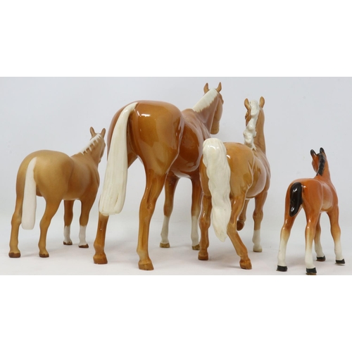 298 - Four Palomino Beswick horses including a matte example, no cracks or chips, largest H: 22 cm. UK P&P... 