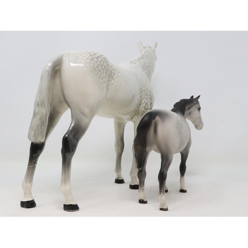 311 - Two Beswick dapple grey horses including a matte example, no cracks or chips, largest H: 21 cm. UK P... 