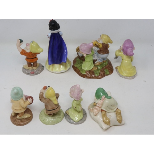 320 - Six Royal Doulton figures from the Snow White and The Seven Dwarves collection, together with Grumpy... 