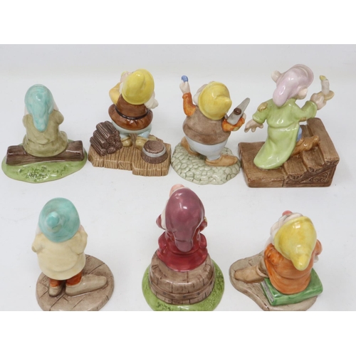 331 - Seven Royal Doulton dwarves from the Disney Showcase collection, no cracks or chips, largest H: 12 c... 