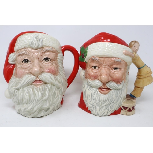 356 - Two Royal Doulton Santa Claus character jugs, D6704 and D6668, no cracks or chips, largest H: 19 cm.... 