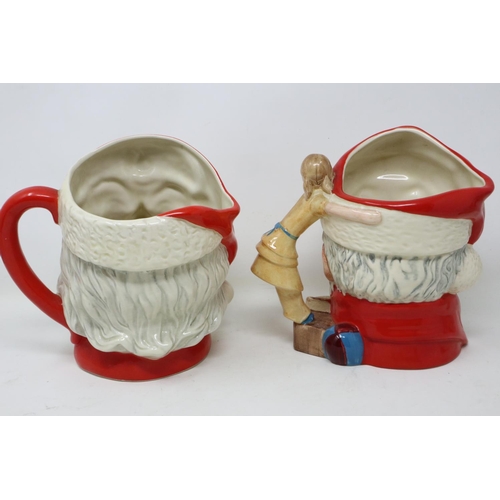 356 - Two Royal Doulton Santa Claus character jugs, D6704 and D6668, no cracks or chips, largest H: 19 cm.... 