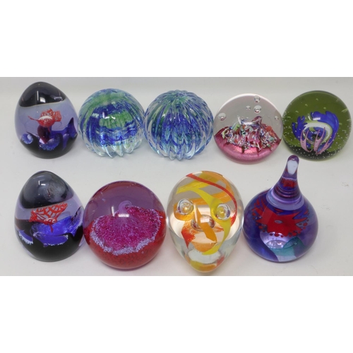 420 - Nine Caithness glass paperweights including Eggstravaganza, Optix, Ascension, Prelude, Myriad, Deser... 